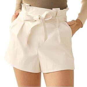 White high-waisted shorts with belt